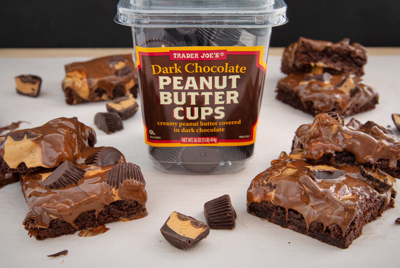 Trader Joe's Dark Choclate Peanut Butter Cups in recipe with chocolate truffle brownie mix; peanut butter cups melting off the tops of the brownies
