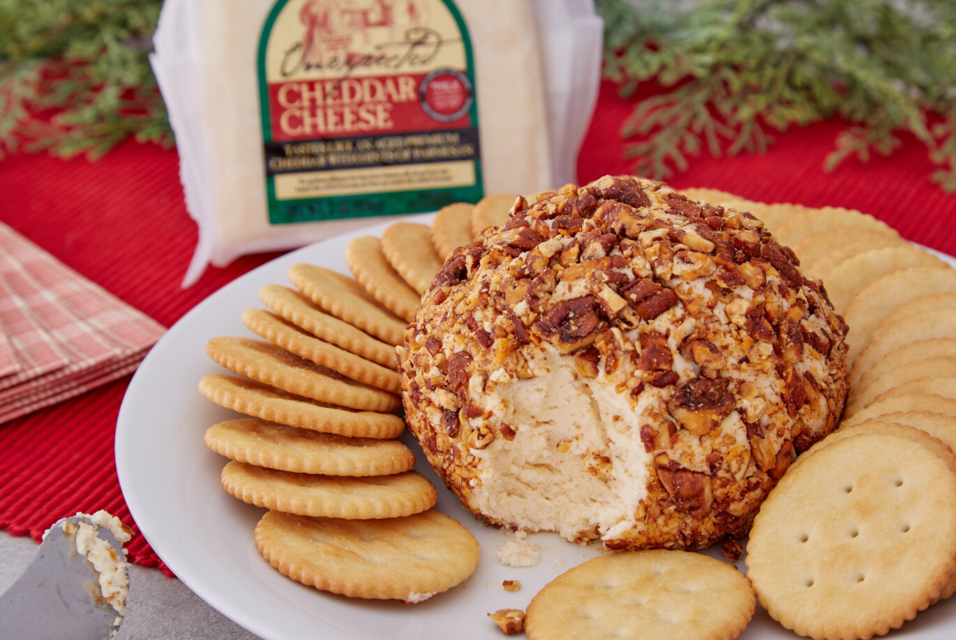 Trader Joe's Unexpected Cheddar Cheese; cheese ball recipe surrounded by savory golden rounds crackers